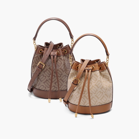 百丽包包女2025春新商场同款复古休闲单肩斜挎手提水桶包X7232AX5