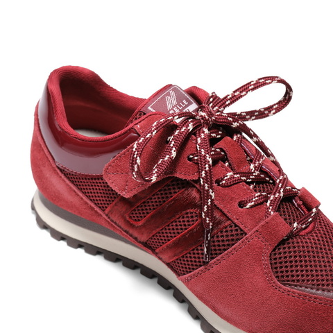 百丽时尚拼色阿甘德训鞋女2025春新商场同款舒适板鞋Y2958A85