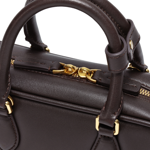 百丽包女2025冬新商场同款复古休闲单肩斜挎手提波士顿包X7471AX6