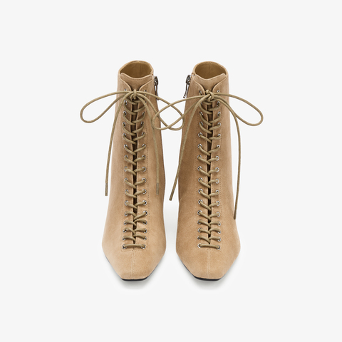 73hours女鞋混搭美学2025冬季新品尖头细跟系带时装靴