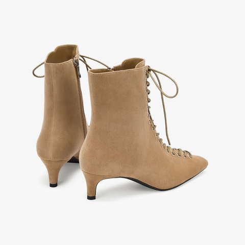 73hours女鞋混搭美学2025冬季新品尖头细跟系带时装靴