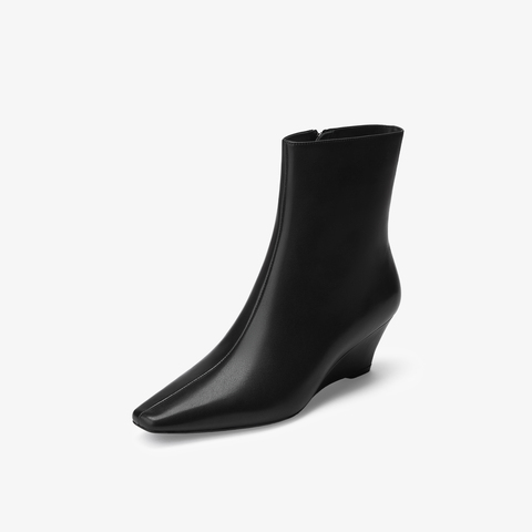 73hours女鞋都市剪影2025冬季新品坡跟尖头纯色时装靴