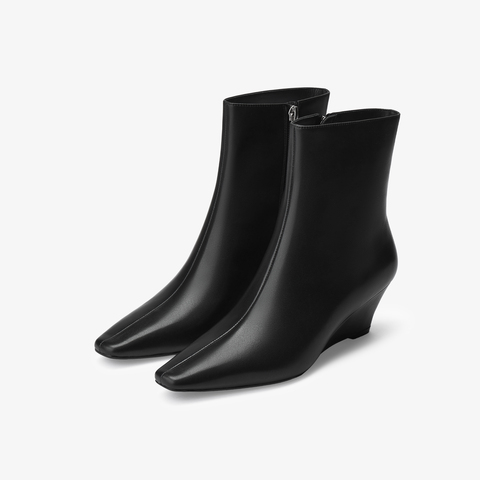 73hours女鞋都市剪影2025冬季新品坡跟尖头纯色时装靴